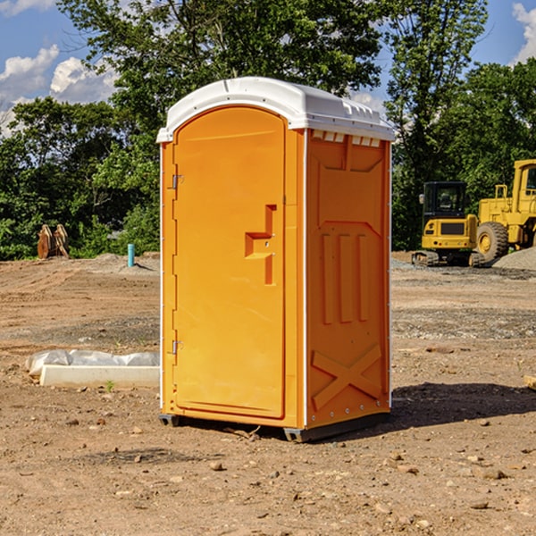 what is the cost difference between standard and deluxe portable restroom rentals in Oak Glen